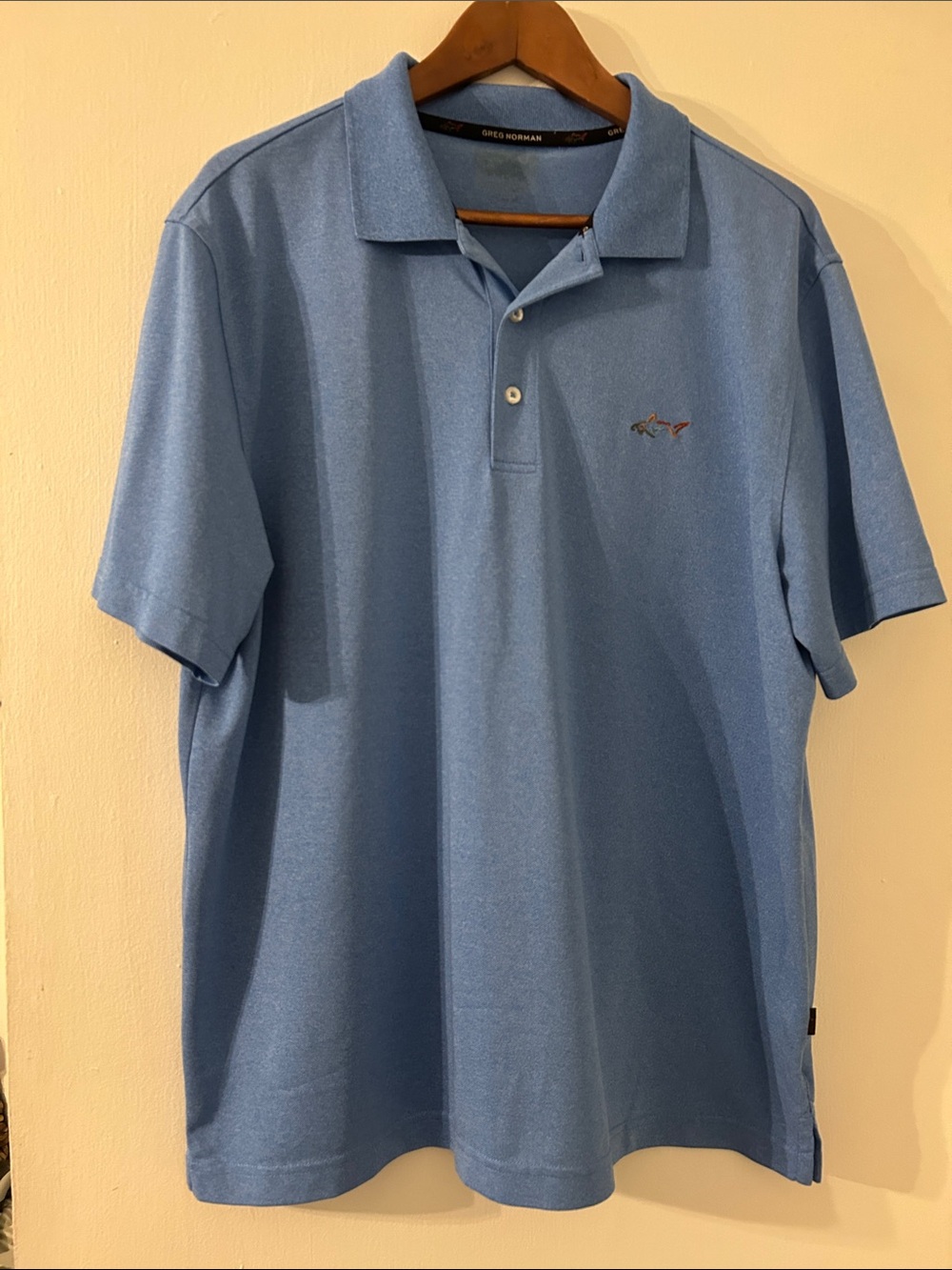 Greg Norman Collection Men's Polo in Light Blue with Embroidered Shark